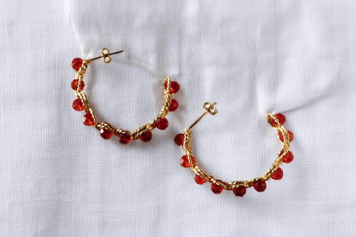Canela Hoops – Braided Gold Hoops with Red Crystal Drops