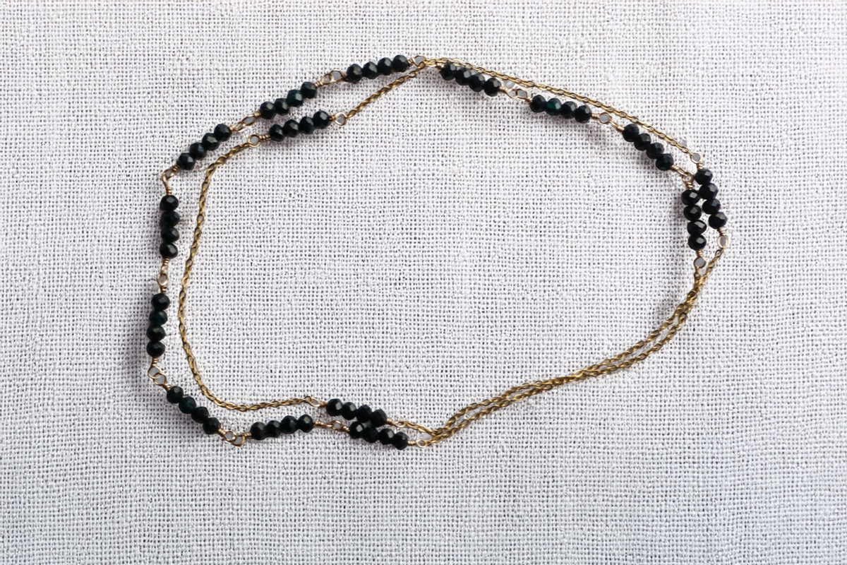 NoirWhisper Necklace – Delicate Multi-Strand Gold Chain with Black Crystal Beads