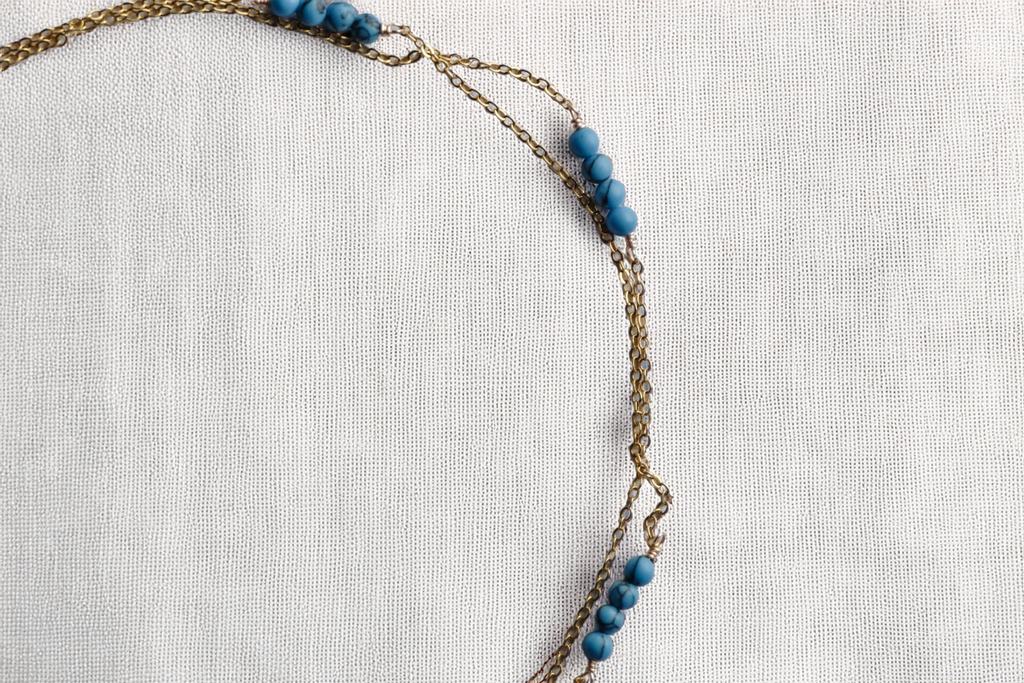 AzureWhisper Necklace – Delicate Multi-Strand Gold Chain with Blue Beads