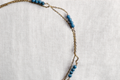 AzureWhisper Necklace – Delicate Multi-Strand Gold Chain with Blue Beads